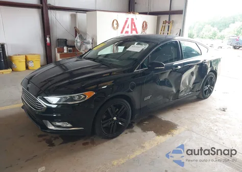 2017 Ford Fusion Energi Titanium from USA, damaged, VIN 3FA6P0SU5HR170197
